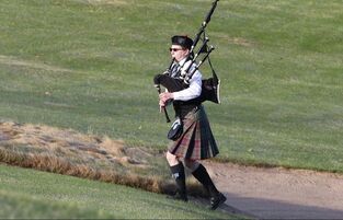 Bagpiping at the start of the first tournament of the season at Madden Inn and Golf Club, Brainerd, MN.