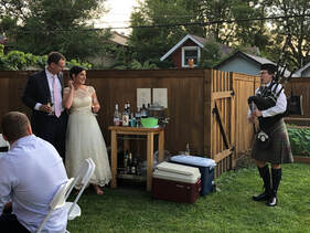 Meridith playing bagpipes for wedding reception