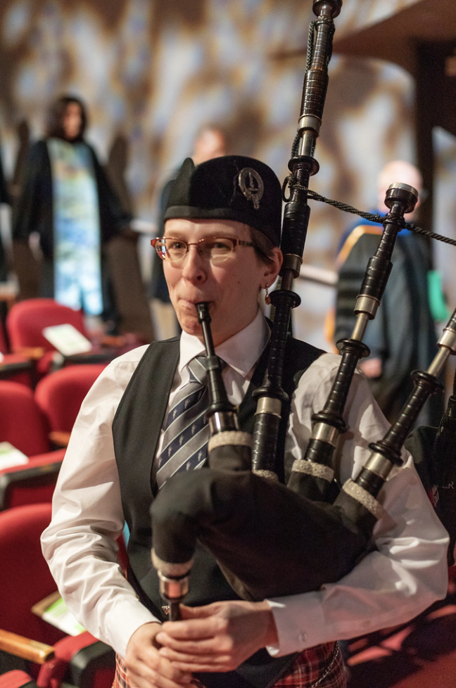 Meridith plays bagpipes for Minneapolis College of Art and Design graduates, Minneapolis, MN