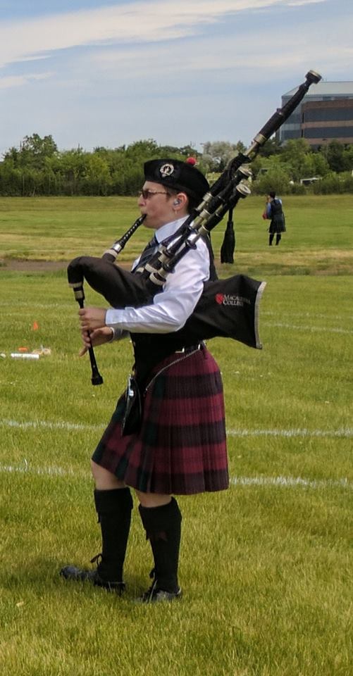 Meridith bagpiping in a solo bagpipe competition in Chicago, Illinois.