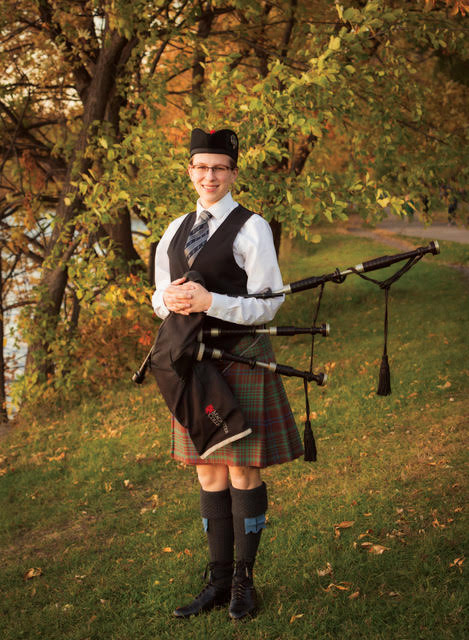 Meridith is ready to bagpipe for a surprise marriage proposal by the lake during sunset, Minneapolis, MN.